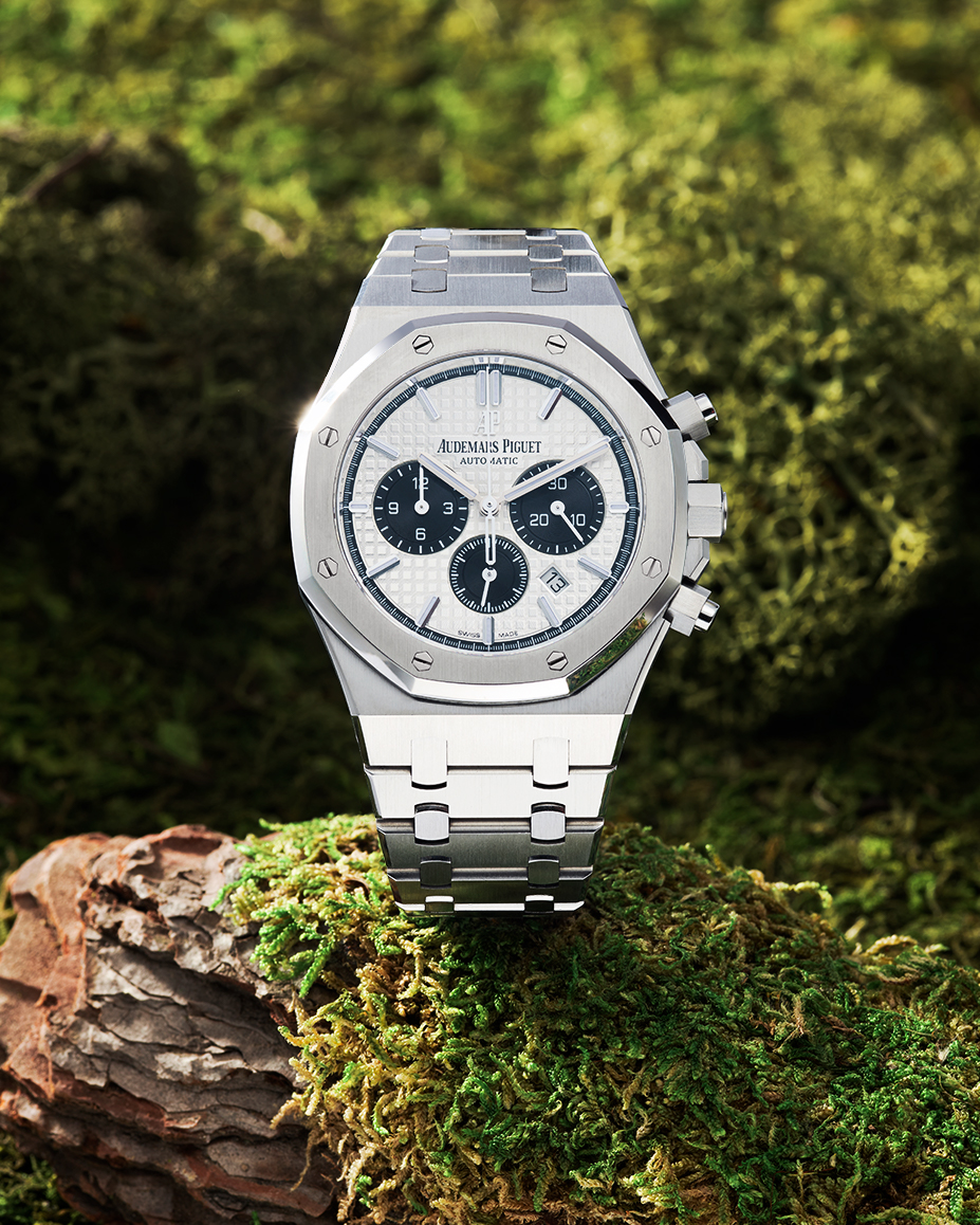 Audemars Piguet  on a moss covered log