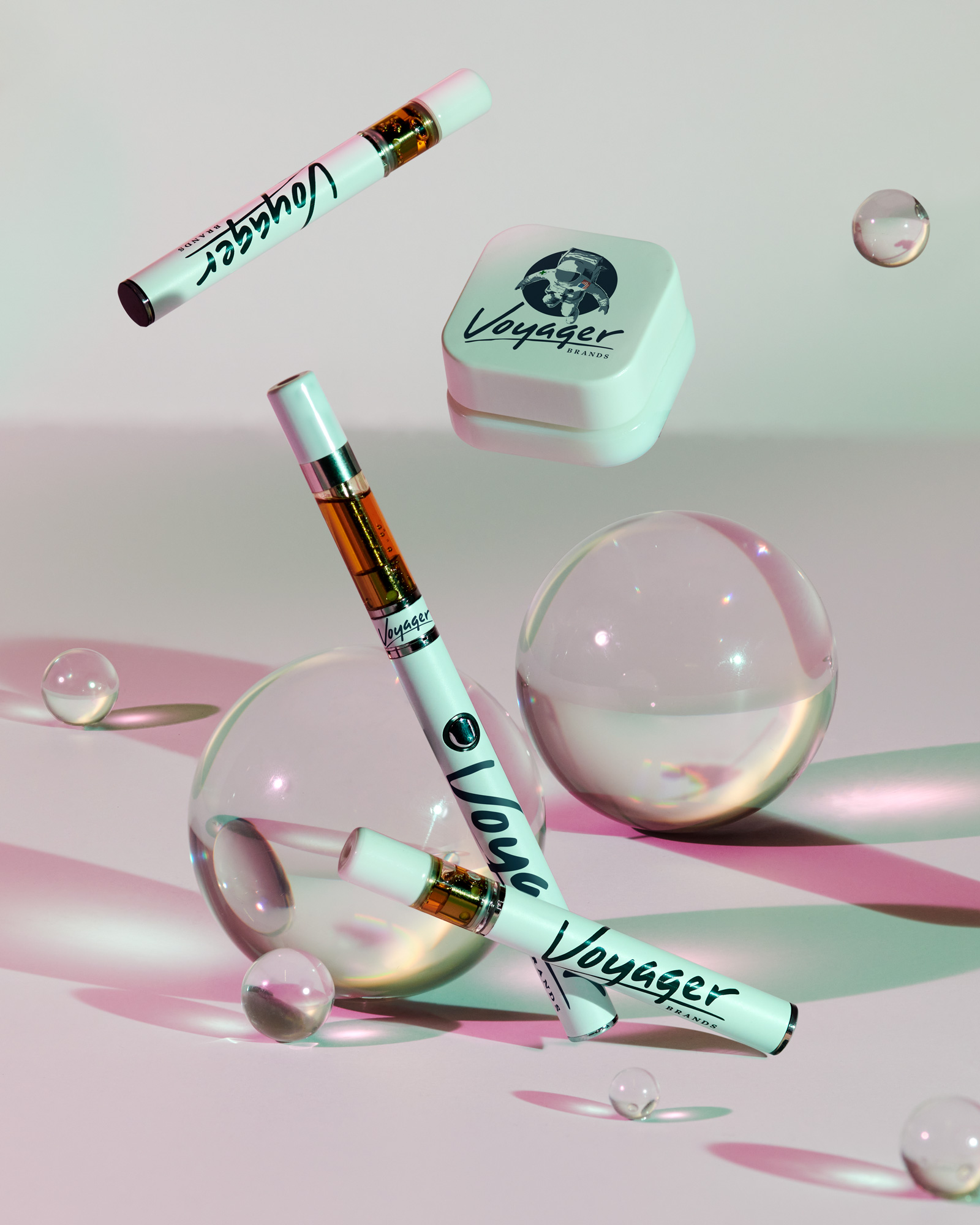 Voyager Brands vapes group in a zero gravity with clear crystal orb