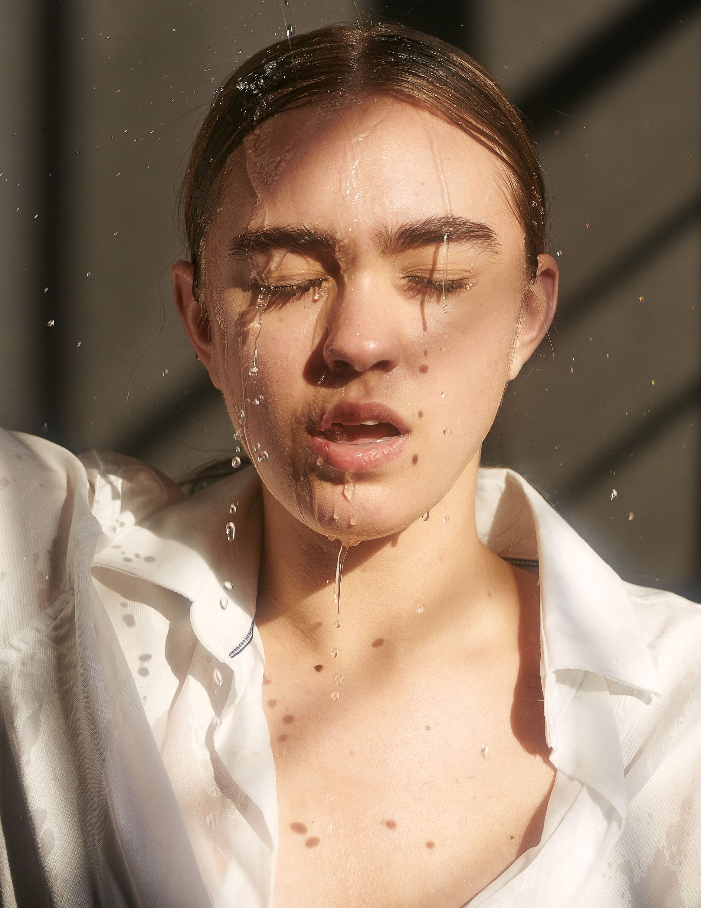 Genetic Model Rachel Hemstreet pouring water down on her face