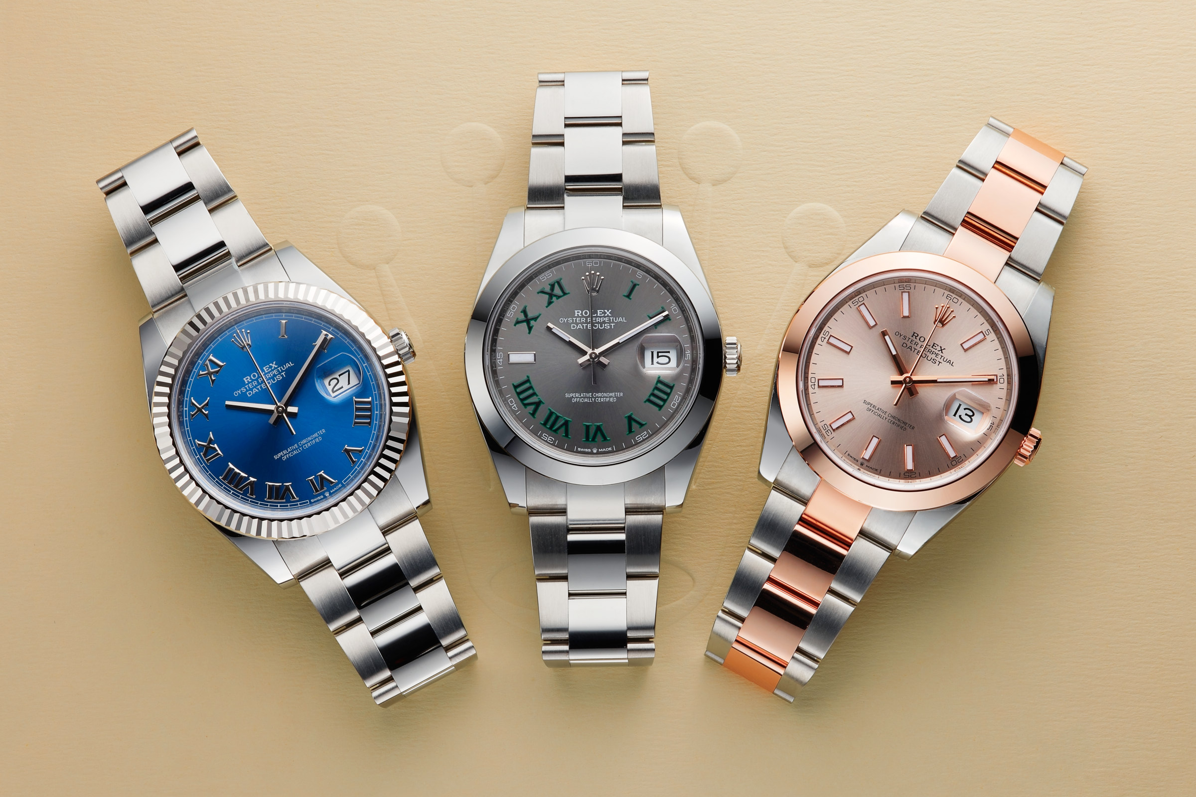 Rolex 126334, 126300, and 126301 on top of the Rolex Box cover with the Rolex logo.