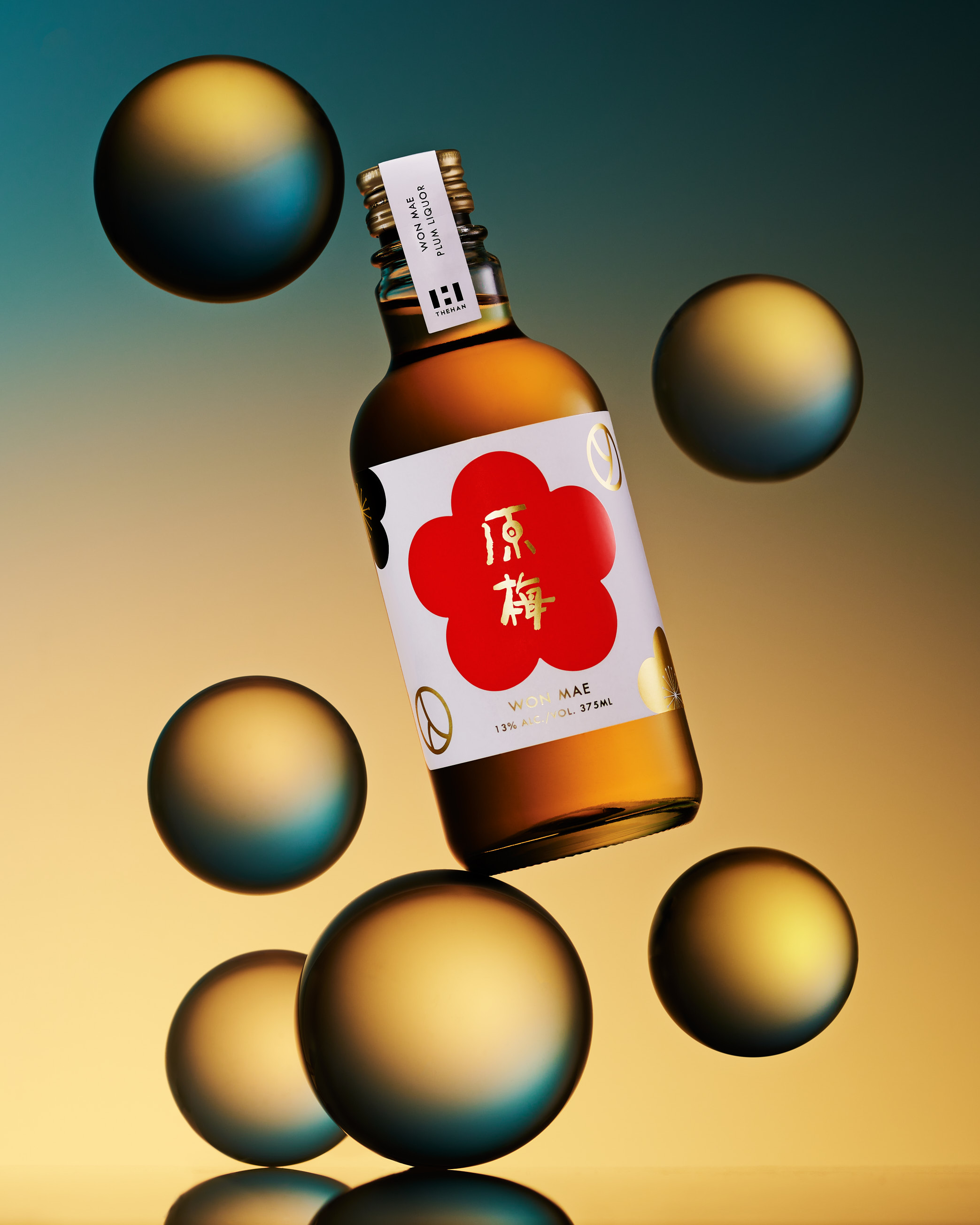 WonMae Soju standing on a clear orb with green to orange gradient backround